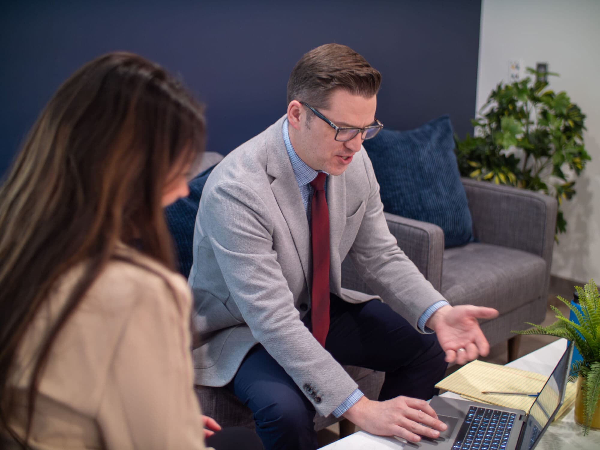 Mission-focused leadership conversation, warm office setting