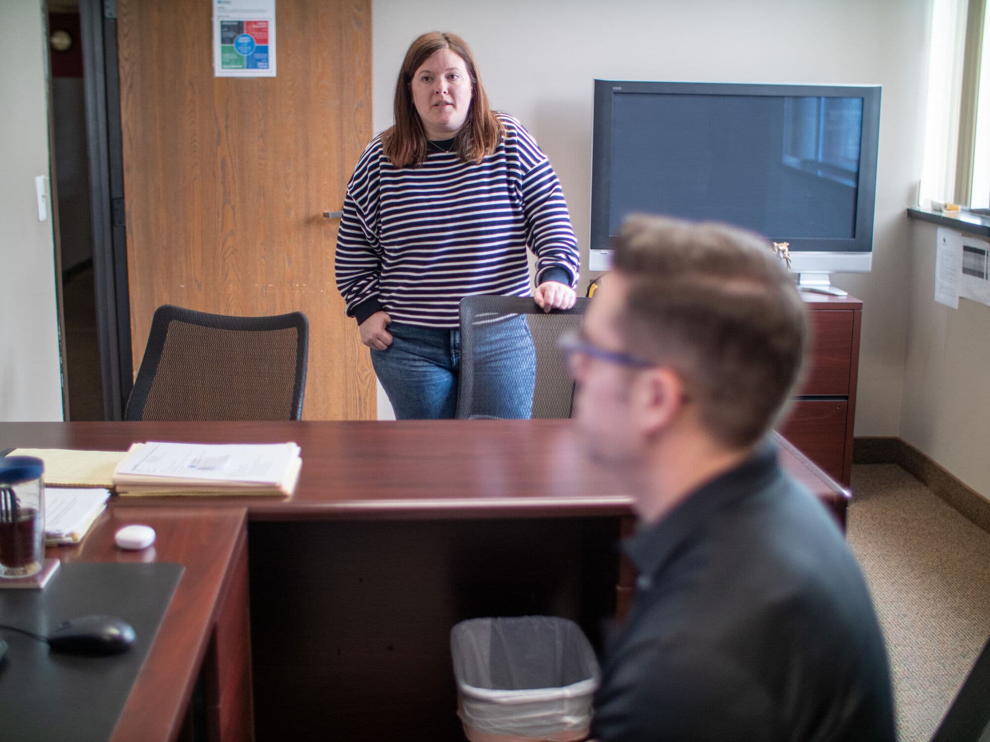 Team conversation in the Livonia Michigan office