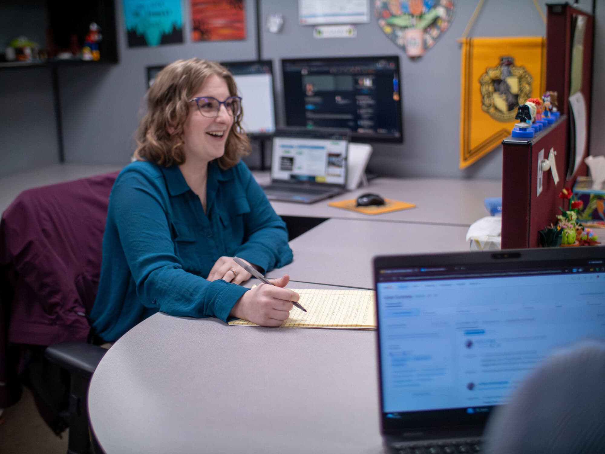 A Qualigence practice leader in a working client conversation